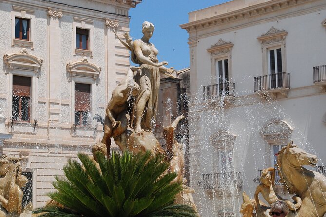 1 hour Calessino/Tuk tuk Tour to Syracuse or Ortigia Island - Temple of Apollo area: passing by one of Ortigia’s big name zones