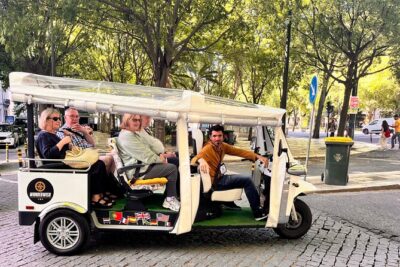 2h Tour | Explore Lisbon’s Hills & Viewpoints - Meeting the guide: a white tuk-tuk and a quick way to get oriented