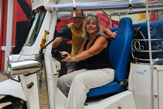 2H Tuk Tuk Tour Central Lisbon - Miradouro de Santa Luzia: the photo wall view over Alfama