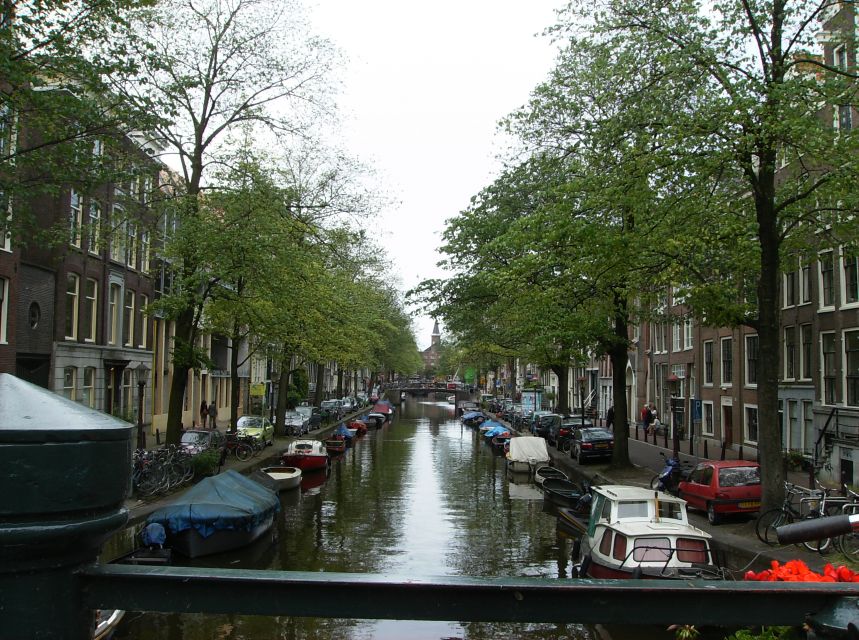 Amsterdam: 2-Hour Sightseeing Tour by Rickshaw - Canals and historic houses: what to notice while you glide