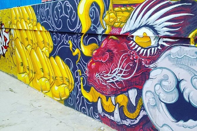 An Afternoon of Contemporary Art in Phnom Penh by Tuk Tuk - A quieter stop between murals: why the small walls count