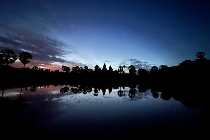 Angkor Tuk Tuk Private Tour Guide To Angkor Wat Sunrise, Angkor Thom & Ta Prohm - Angkor Thom and Bayon’s smiling faces: the best second act