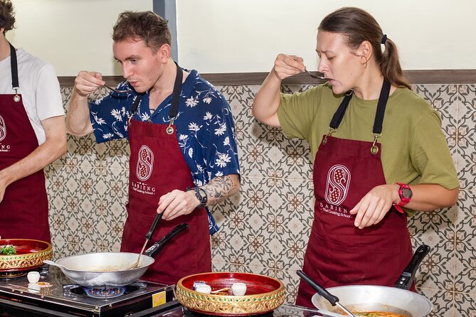 Authentic Thai Cooking with the Largest market visit &TukTuk ride - Inside Sabieng Thai Cooking School: clean kitchen, real prep work