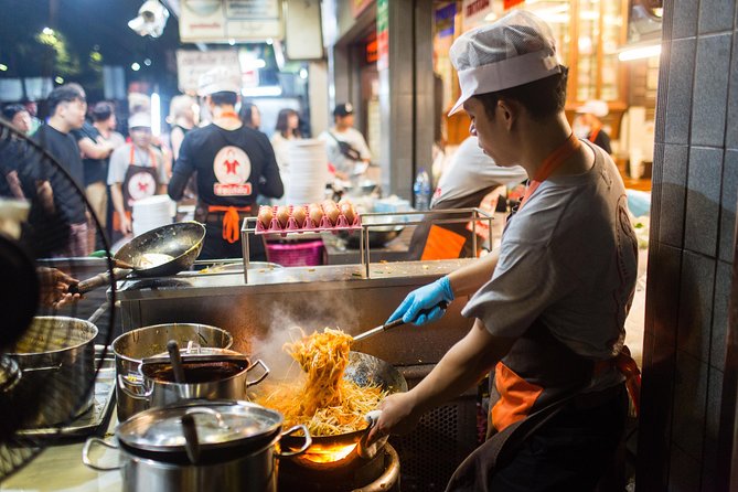 Bangkok by Night: Temples, Markets and Food Tuk-Tuk Tour - Temple expectations: closed buildings, open atmosphere, and photo moments