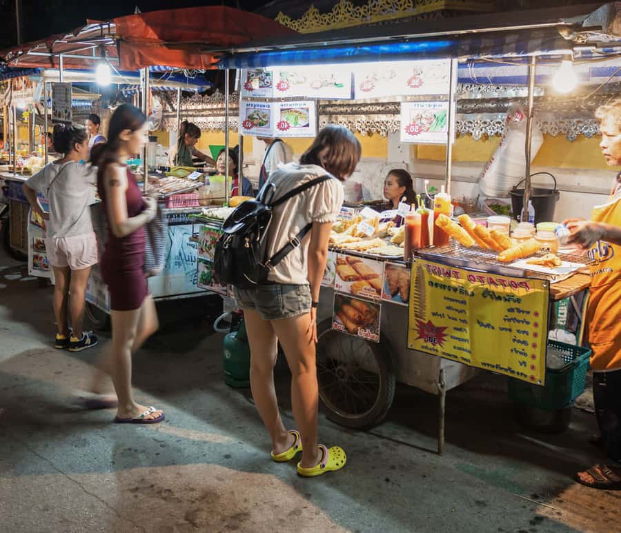 Bangkok Night Tuk Tuk: Private Tour of Markets & Landmarks - The Calmer Temple Stop: White Stupa, Turtle Ponds, and a Night Reset