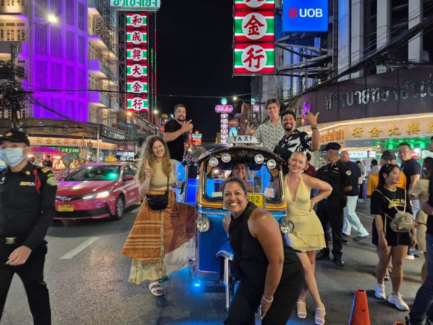 Bangkok: Tuk Tuk Adventure Chinatown Michelin Food & Temples - Wat Traimit, Chinatown Gate, and the First Night Photos That Set the Tone