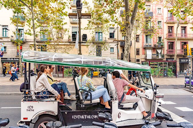 Barcelona Historical Tour with Local Guide in Eco Tuk Tuk Private - Plaça de Catalunya: the city’s nerve center in one quick pass