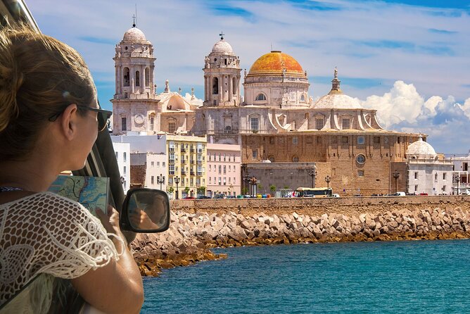 Cádiz TukTuk Tour with Audio Guide - Playa de La Caleta: postcard views with Atlantic air