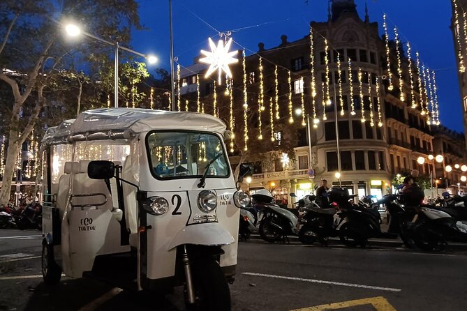 Christmas Lights Tour of Barcelona in Private Eco Tuk Tuk - Passeig de Gràcia lighting tour: Casa Batlló, La Pedrera, Robert Palace, and Casa Calvet