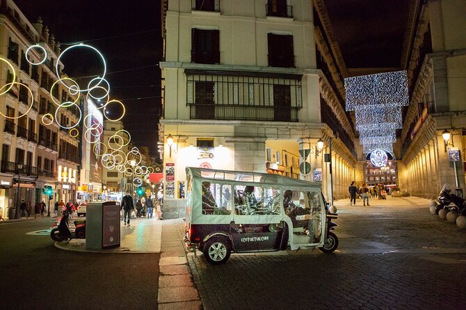 Christmas Lights Tour of Madrid in Eco Tuk Tuk Private - Plaza de Canalejas and the Cortes: neoclassical drama without the museum crowds