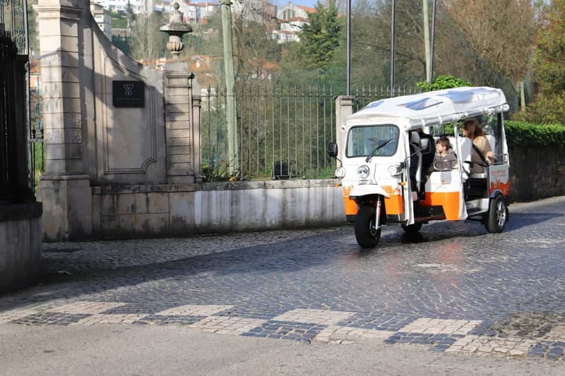 Coimbra: TukTuk Adventure. Local and multilingual host. Hotel pickup. - Your Local Multilingual Host: What You’re Really Paying For