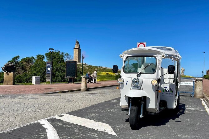 Discover Coruña 1 hour Private Tour in Tuk tuk - The ride experience: audio guide, AC, and real comfort