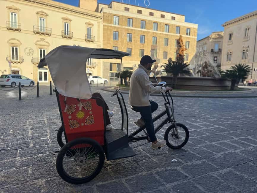 Discover the wonders of Ortigia: a Tuk-Tuk tour through history and the sea. - Mitoraj Sculpture stop: art breaks up the monument rhythm