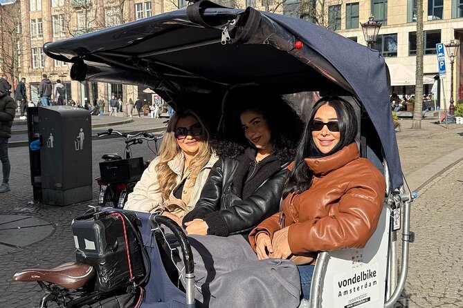 Explore Amsterdam in 75 Minutes – Pedicab Rickshaw City tour - Pickup and meeting at Muntplein: simple, but check your timing