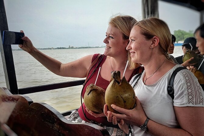 From Ho Chi Minh City: Discover Mekong Delta & Coconut Village - Ben Tre coconut island: walking, homestyle stops, and fruit moments