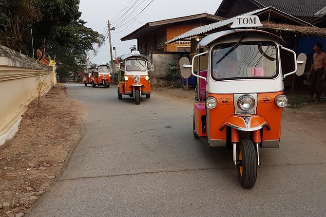 Full-Day Guided Tuk Tuk Chiang Mai Adventure and Rafting - The mountainside temple stop: monks at work, not just a view
