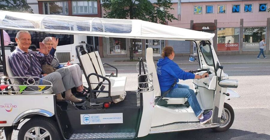 Helsinki City: 2.5-Hour City Tour with Electric TukTuk - Pickup, headsets, and weather protection that actually helps