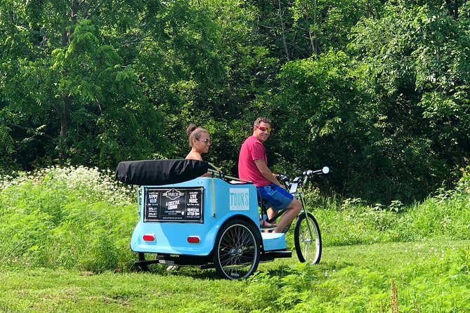 Hi-5 Rickshaw Tour Traverse City - First Thing You MUST Do in TC! - Stop 3 on E Front Street: where the downtown stories actually land