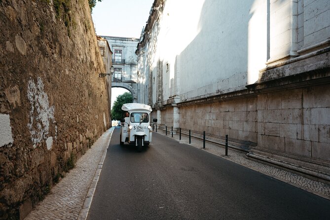 Historic Lisbon Tour with Local Guide in Private Eco Tuk Tuk - Bairro Alto’s cobblestones and night-life reputation