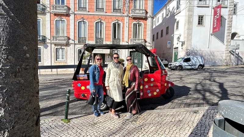 Lisboa: Tuk Tuk ride in Alfama & pick-up you at the hotel. - Food and small extras: pastry and liquor included for a reason