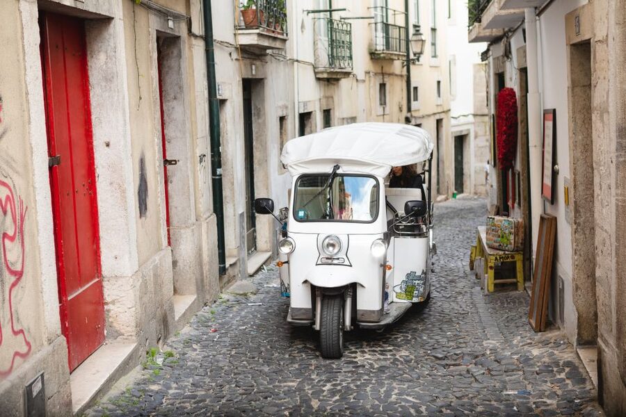 Lisbon: 2h Old Lisbon Tuk Tuk Tour - Miradouro da Senhora do Monte to Mouraria: big city feel from a small street ride