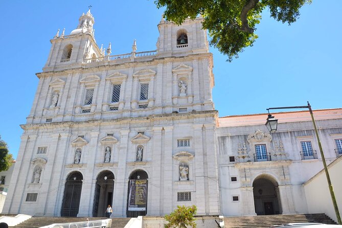 Lisbon City 4 hour Private eco Tuk Tuk Tour: Love at First sight - Largo do Carmo and São Pedro de Alcântara: jacarandas and a big terrace view