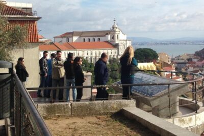 Lisbon: City Tour by Tuk Tuk - Alfama on the move: Narrow streets, colors, and real neighborhood energy