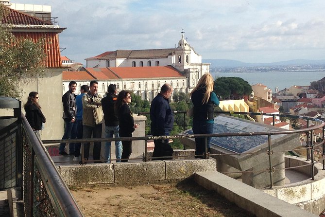 Lisbon: City Tour by Tuk Tuk - Alfama on the move: Narrow streets, colors, and real neighborhood energy