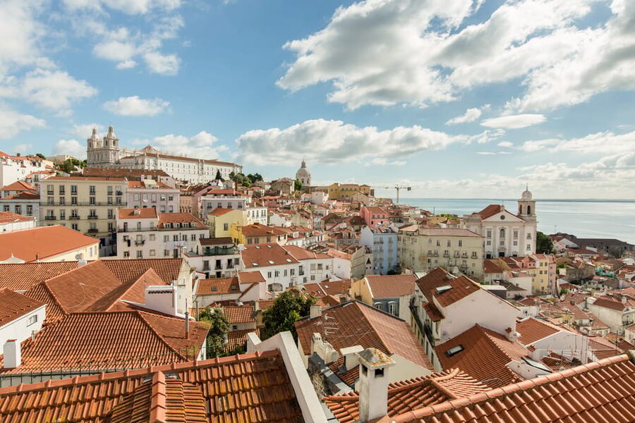 LISBON GRAND EXPERIENCE Tuktuk Tour in German - Heading west to Belém: UNESCO sites tied to the Age of Discoveries