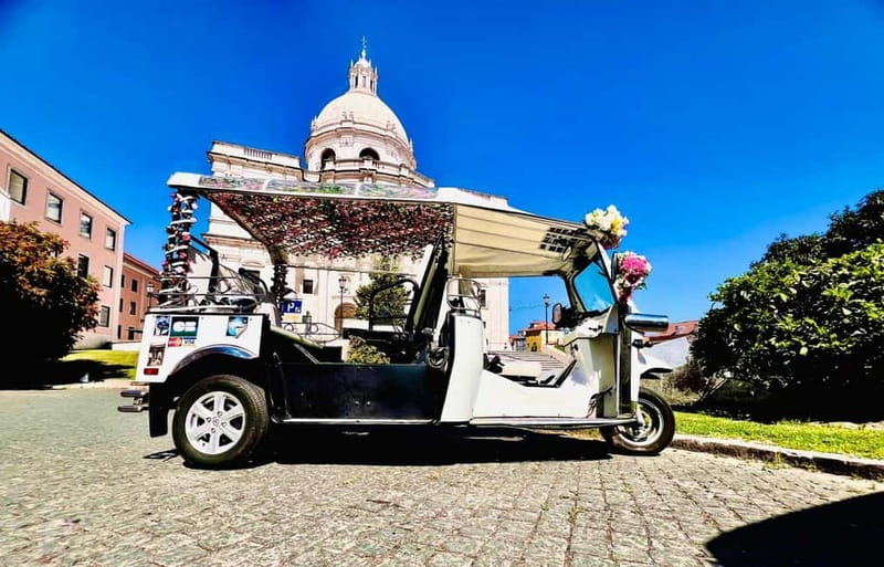 Lisbon: Guided Sightseeing Tour by Tuk Tuk - Alfama, Fado, and Marketplace Passing Moments