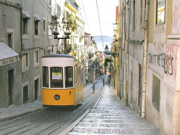 Lisbon Highlights by Tuk Tuk - Alfama: Old Streets, Quick Context, and Ticketed Time
