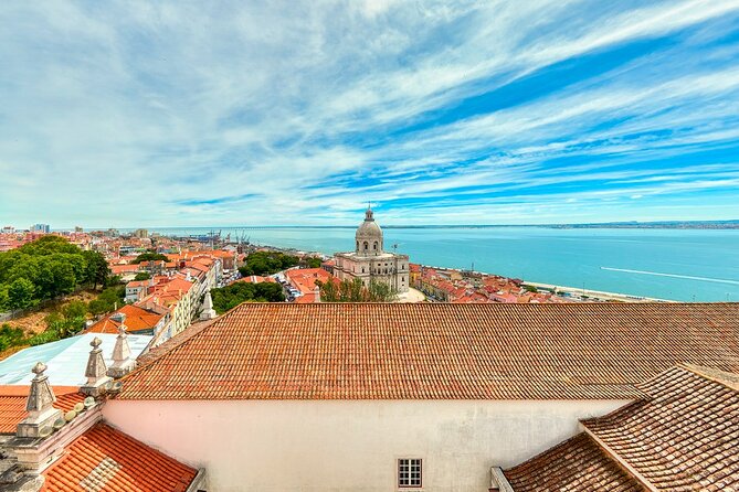 Lisbon Private Tour by Electric Tuk Tuk - Restauradores Square to Rossio Station: getting your bearings fast
