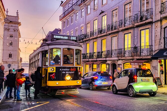 Lisbon tour Oldtown & Viewpoints on a tuktuk - Alfama walk: narrow streets, laundry balconies, and fado drifting by