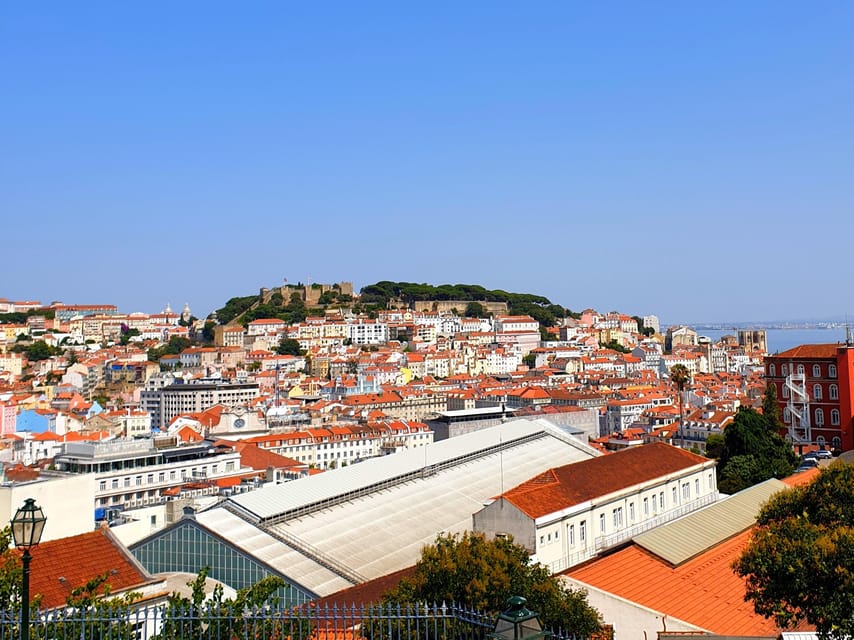 Lisbon: Tuk Tuk 2H Tour Lisbon with a Old Timer - Elevador de Santa Justa: famous elevator views, minus the waiting