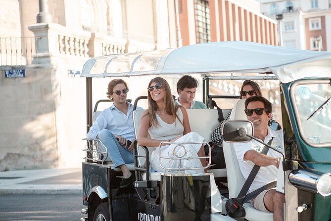 Madrid Expert Tour with Local Guide in Eco Tuk Tuk Private - Jerónimos, Puerta de Alcalá, and Salamanca Streets Without the Sprinting