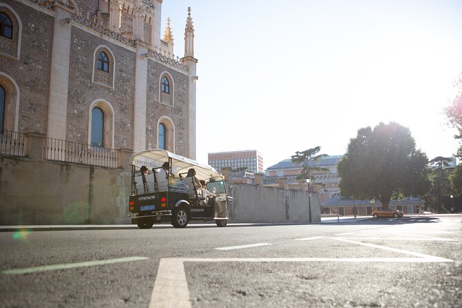 Madrid Express Tour with Local Guide in Eco Tuk Tuk Private - San Jerónimo el Real and Puerta de Alcalá: Gothic + Renaissance, Then Neoclassical Triumph