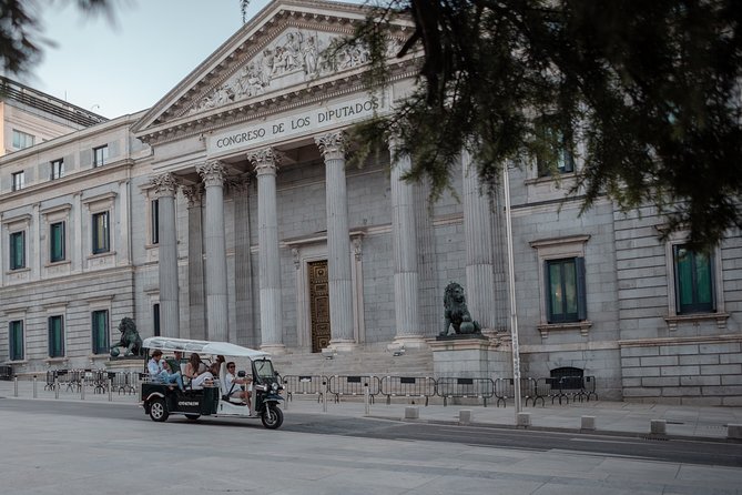 Madrid Historical Tour with Local Guide in Eco Tuk Tuk Private - Atocha station: not just a train hub, but Madrid’s busiest front door