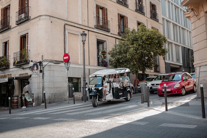 Madrid Historical Tour with Local Guide in Eco Tuk Tuk Private - Plaza del Dios del Mar and Cibeles: football rivalries made into monuments