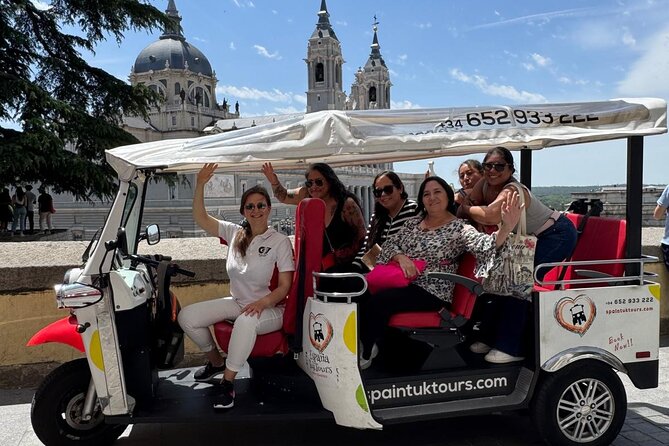 Madrid Tuk Tuk & Olé Experience – Private 1.5h Cultural Tour - Royal Palace of Madrid + Almudena Cathedral: monarchy meets meaning