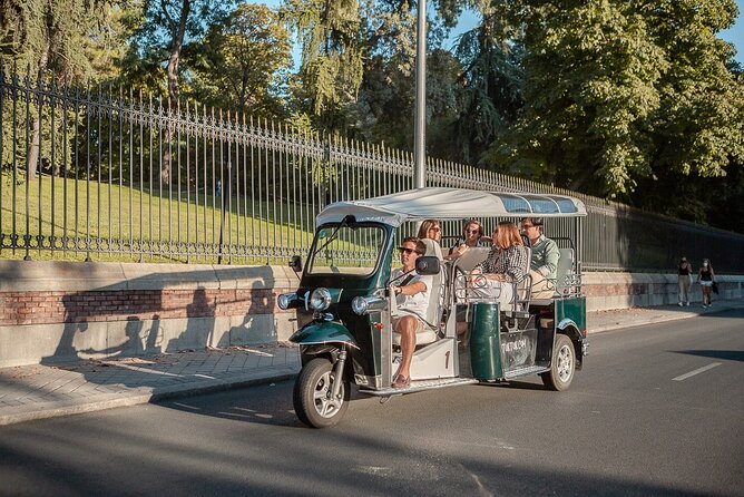Madrid Welcome Tour with Local Guide in Eco Tuk Tuk Private - Cibeles and Neptune: when sports fandom meets city design