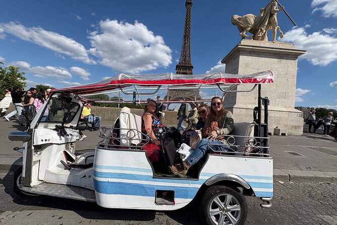 Paris Sightseeing by Tuk Tuk Golf Cart 2 hours - A two-hour loop of Paris that helps you see the whole city