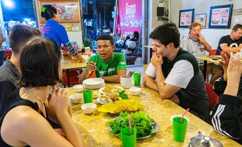 Phnom Penh: Evening Food Tour with Drinks & Tuk Tuk Included - Riverfront warm-up: street snacks and after-work energy