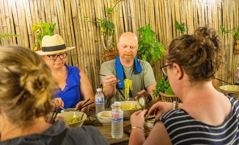 Phnom Penh: Night Foodie Tour by Tuk Tuk with Drinks - Russian Market Dinner: BBQ Chicken, Pork Ribs, and Market Desserts