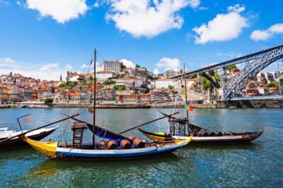 Porto: Tuk-Tuk Tour, Douro River Cruise, and Wine Tasting - Largo Actor Dias start: a quick orientation in a 50-minute electric tuk-tuk