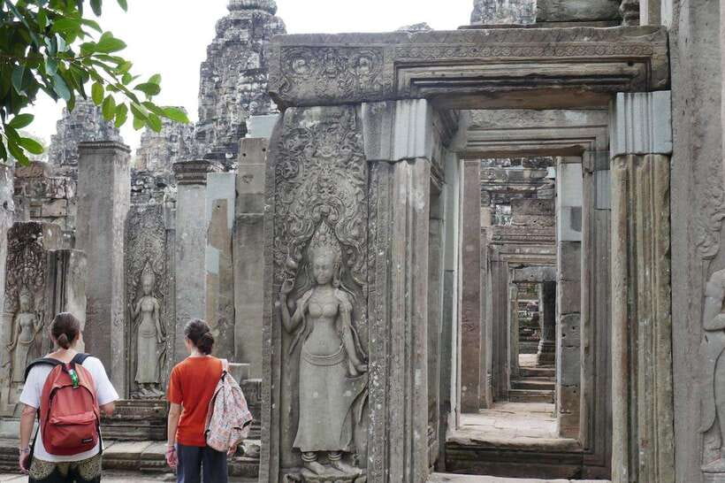 Private Angkor Sunrise, Guide Breakfast and Tuktuk included - Bayon and Angkor Thom: faces, capital life, then the South Gate