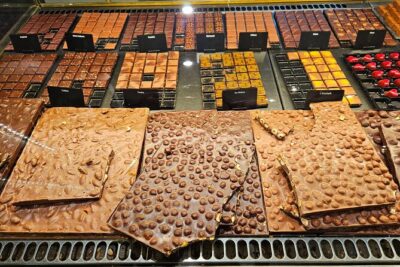 Private Chocolate Tour in Geneva by Tuk Tuk - Stop 1: Place Bourg du Four and a chocolate factory in old-town streets