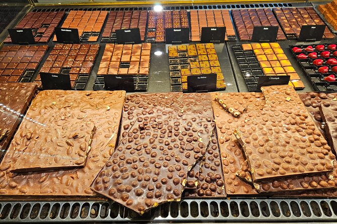Private Chocolate Tour in Geneva by Tuk Tuk - Stop 1: Place Bourg du Four and a chocolate factory in old-town streets