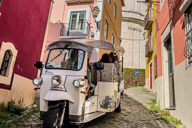Private Half-Day Eco Tuk Tuk Tour in Lisbon - Ginjinha and food moments: included liquor, optional sweets