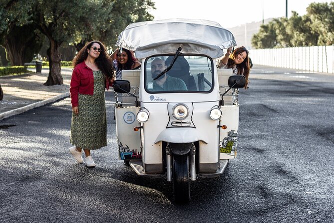 Private Half-Day Eco Tuk Tuk Tour in Lisbon - Alfama to Chiado: old Lisbon on narrow streets with real-photo odds