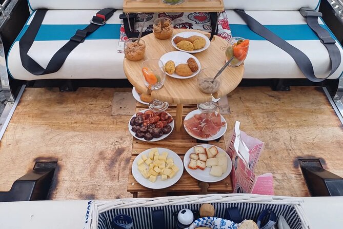 Private tapas tuk tuk tour through Lisbon - Stop 2: Miradouro das Portas do Sol for Tagus and rooftops